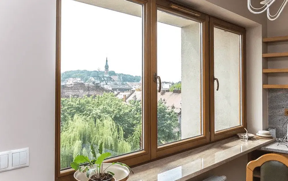 Jak dobrać parapet wewnętrzny do okna – wymiary, materiały i estetyka